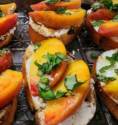 Peach crostini with honey and basil appetizer